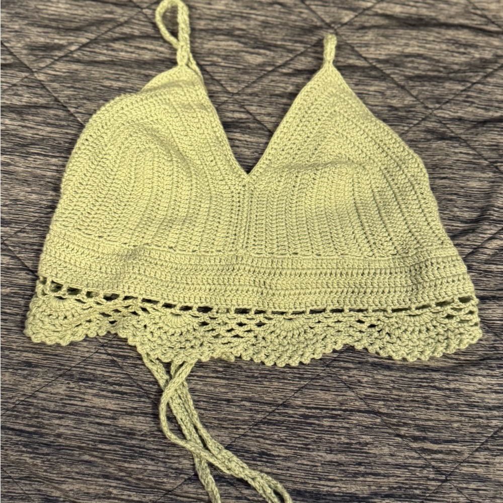 Crocheted crop top with tie back from. Earth bound.